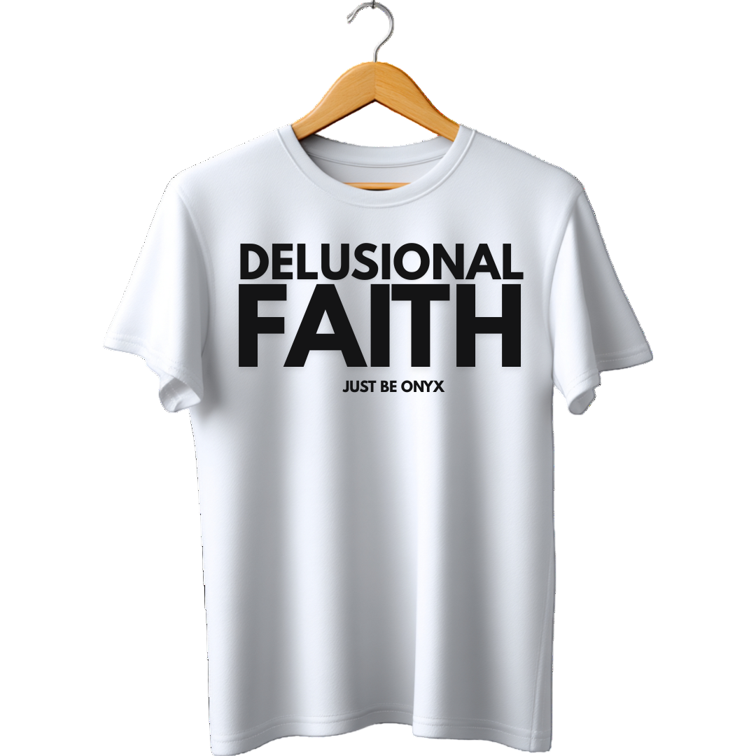White t-shirt with 'Delusional Faith Just Be Onyx' text on a hanger against a white background