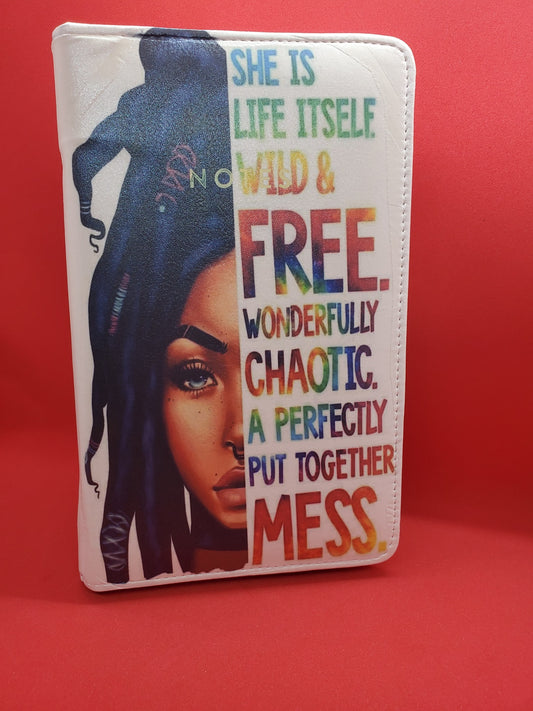 White Leatherette Journal with a Woman on one Half and the other half, the words "She is Life it'self Wild &Free. Wonderfully Chaotic. A perfectly put together Mess.