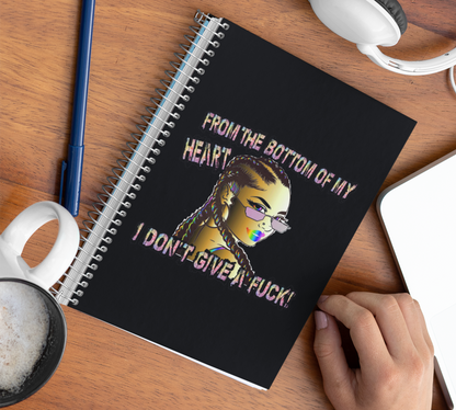 Black Spiral notebook with a Girl with cornrolls. The words "From the bottom of My Heart, I don't Give a Fuck!"