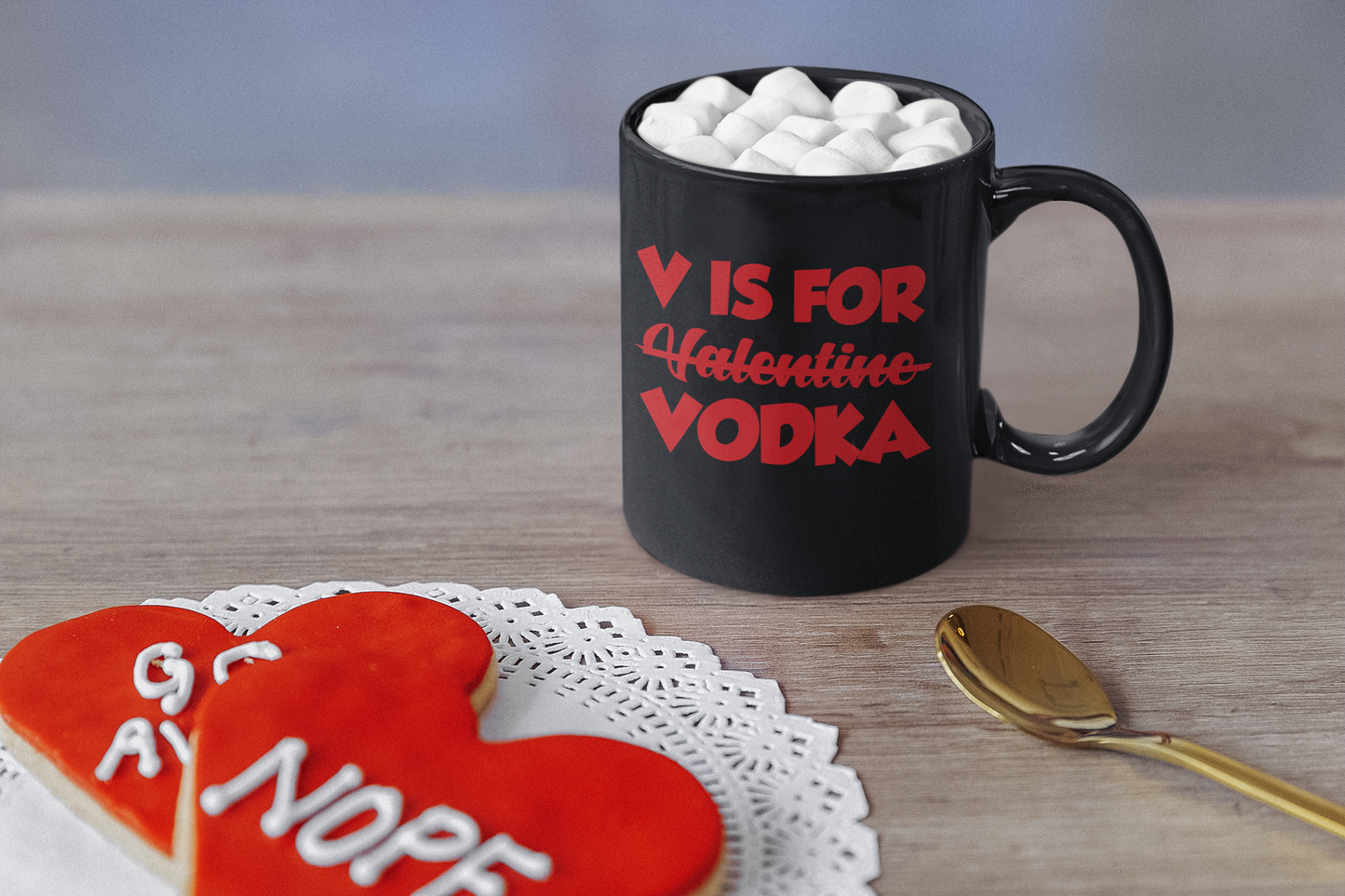Black mug with red letters "V is for vodka" instead of Valentine